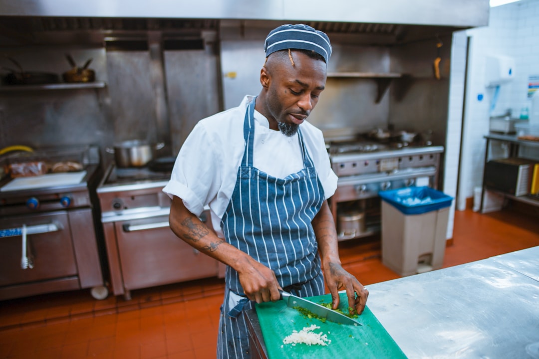 Chef preparing food in restaurant kitchen